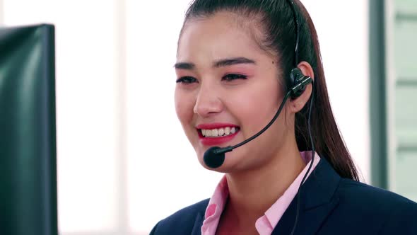 Business People Wearing Headset Working in Office