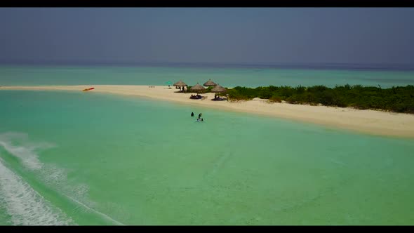 Aerial above travel of marine coast beach break by shallow water and white sand background of journe