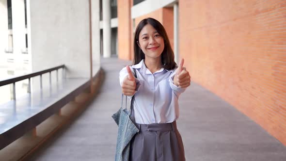 stylish girl with smartphone posing outdoors with a smile