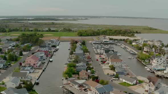 Aerial Drone View of Local Residential Suburb of River in View of Distant Toms River