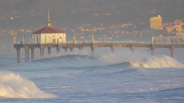 The Manhattan Beach Pier stands majestic over the Pacific Ocean.