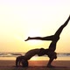 Fit Sporty Couple Practicing Acro Yoga with Partner Together on the Sandy Beach - VideoHive Item for Sale