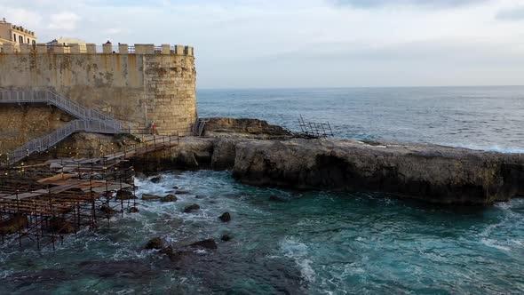 View of the Embankment of the Island of Ortigia During Sunrise