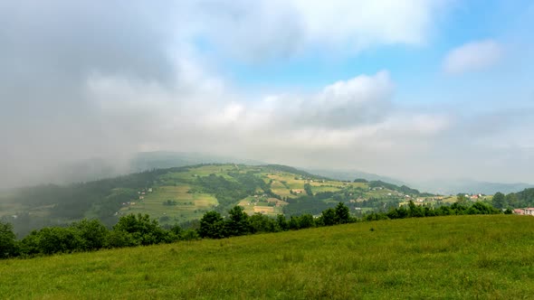 Clouded hills.