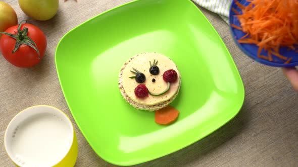 Healthy Food Art Snack for Kids. Funny face on a plate