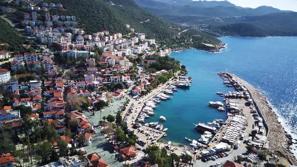 The top view from the drone of Kas resorts, bay, yahts, city in Mugla in Turkey