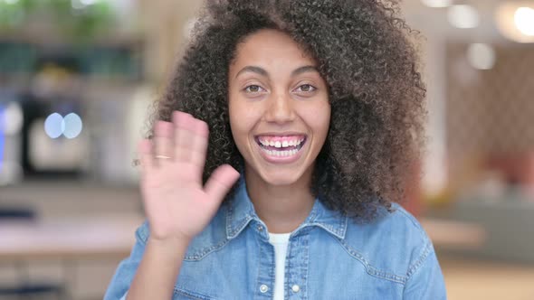 Waving African Woman Welcoming People