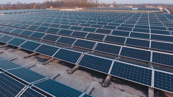 Rows of photovoltaic panels on a flat roof