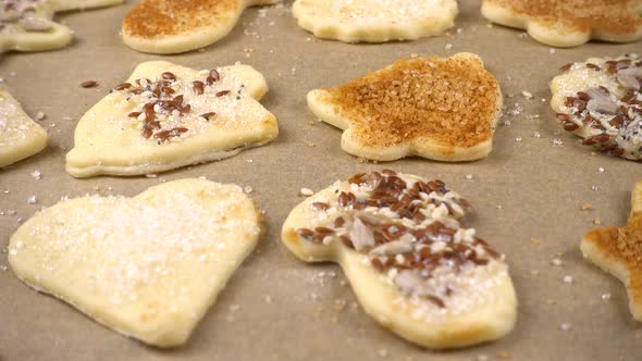 The process of making cookies from shortbread dough.