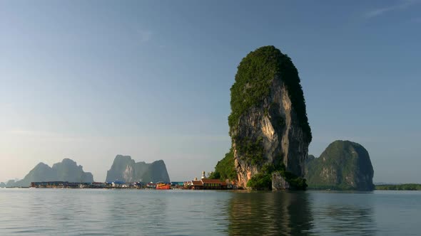 Koh Panyee Fishing Village in Ao Phang Nga National Park, Thailnad. Gimbal Shot From Boat