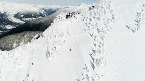 Skier skiing on a snow capped mountain 4k