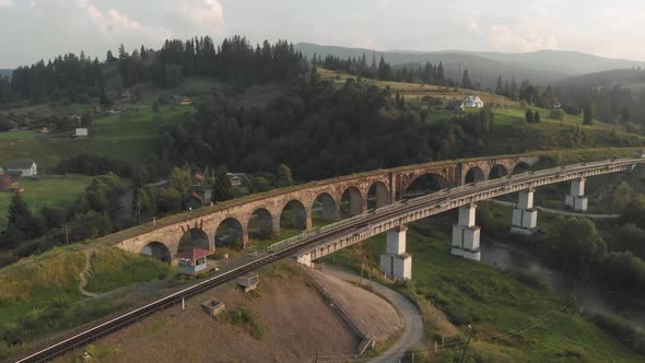 Picturesque Landscape of Ancient Railway Bridge and Village of Vorokhta