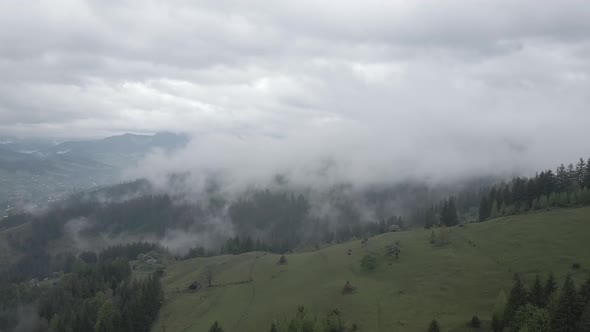 Ukraine, Carpathians: Fog in the Mountains. Aerial. Gray, Flat