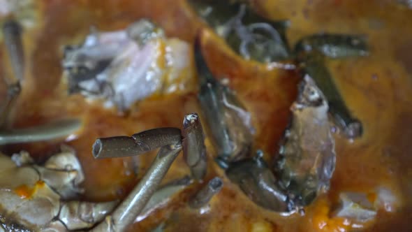 Close Up Shot Crabs Boiling Cooking In Chili Sauce Singapore Curry Style Signature Dish