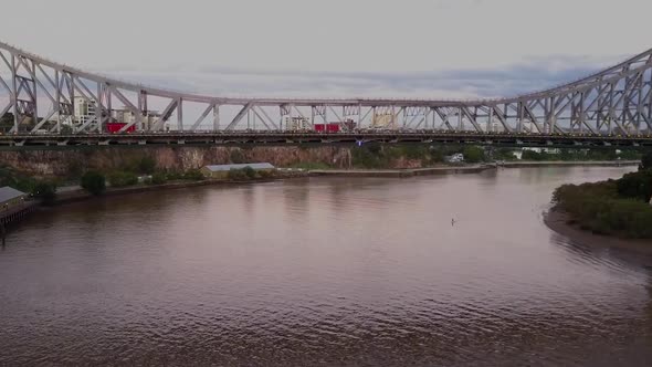 Aerial shot flying under Story Bridge on Brisbane River, Queensland