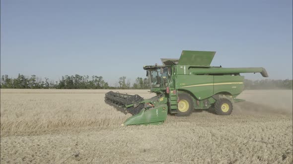 Combine Harvesting Wheat Top View of a Wheatfield