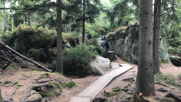 Walk through the rock blocks. Bare rocks high in the mountains. Rock town. Taken in Sto?owe Mountain