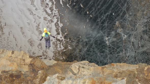 Extreme Bungee Jump Over the Ice of a Frozen Lake.