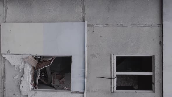 Vertical Video of the Consequences of the War in Ukraine  a Destroyed Building