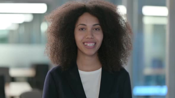 Portrait of African Businesswoman Talking on Online Video Call