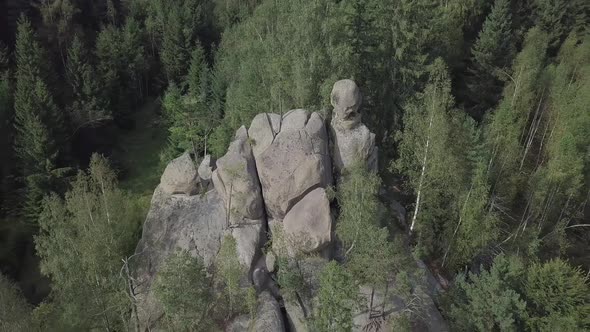 Stone rocks Ternoshorska Lada amidst beautiful scenic Carpathian forests, Ukraine