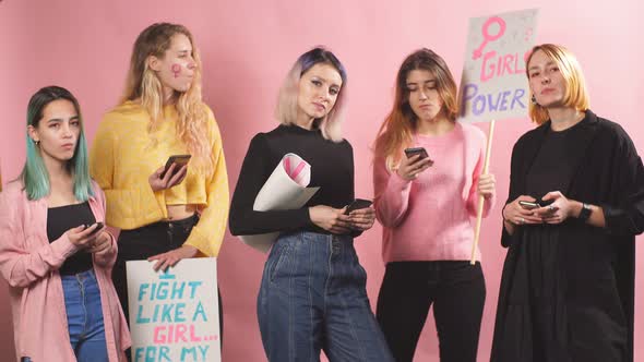 Group of Young Caucasian Feminists Girls Fighting for Women Rights Together