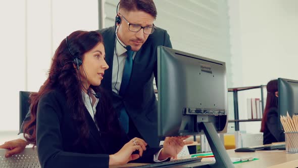 Business People Wearing Headset Working in Office