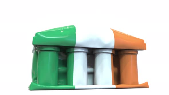 Deflating Inflatable Bank Building with Flag of Ireland