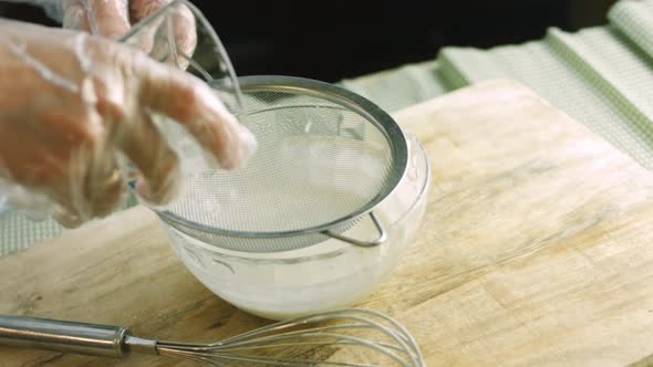 I Give Powdered Sugar Through a Stainless Steel Sieve