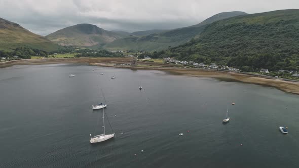 Yachts Boats Ships at Scotland Ocean Bay Aerial