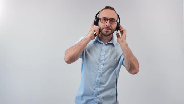 Joyful Casual Man Listen Musical Audio Use Earphones Dancing