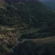 Dusk in the mountain valley, drone flies over river, mystical landscape with deep autumn forest - VideoHive Item for Sale