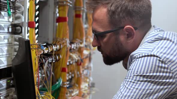 Engineer Working in Data Room