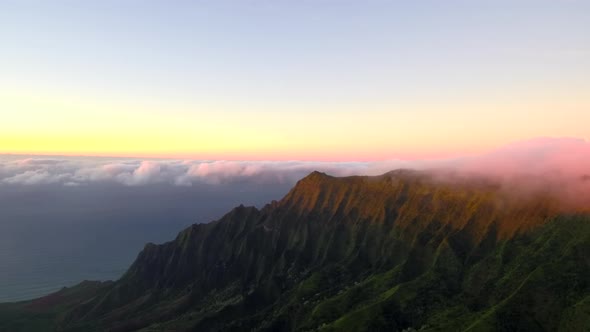 Epic kauai cliffs on sunset clouds