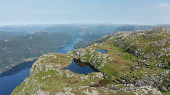 Flying on the edges over Amazing Norwegian fjord Veafjorden