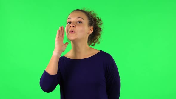 Portrait of Curly Woman Screaming Calling Someone. Green Screen