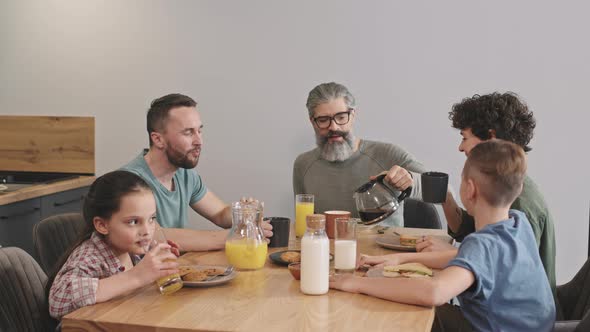 Big Family Having Breakfast Together