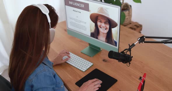 Influencer woman doing podcast using computer at home - Technology trend concept