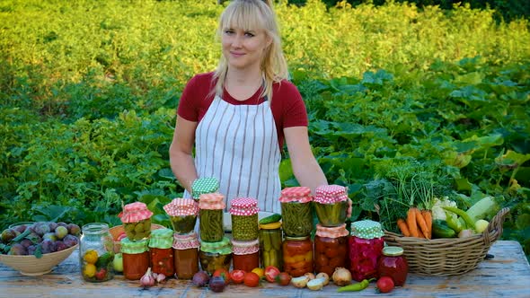 A Woman is Preserving Vegetables