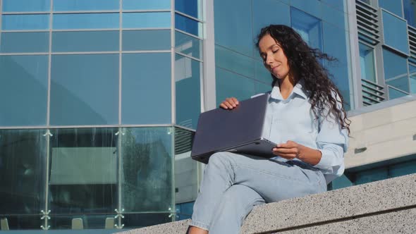 Portrait of Business Woman Finishing Work Studying Sitting in City Outdoors