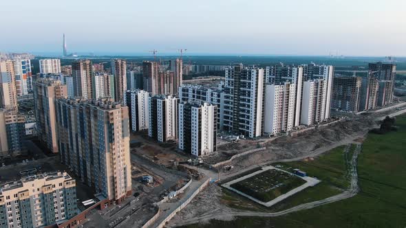 Construction Site with Highrise Buildings and Cranes