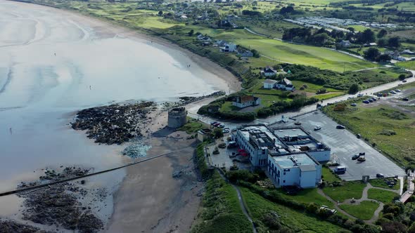 Aerial view over coastline Irish village