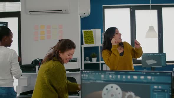 Enthusiastic Diverse Engineers Women Dancing in Company Office