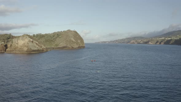 Aerial view of people doing kayak at Ilheu da Vila, Azores, Portugal.