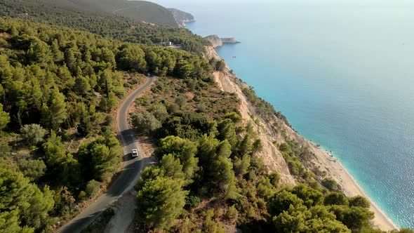 Suv Car Travel at Greece Island Road in Mountains