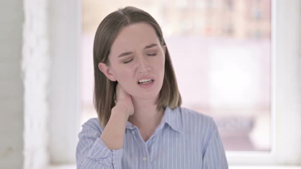 Portrait of Tired Young Woman Having Neck Pain