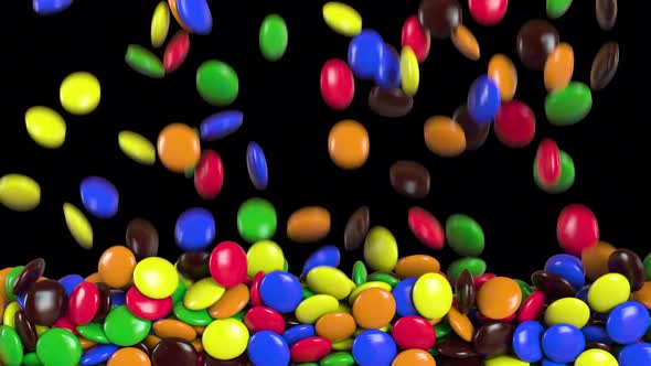 Round colored candies falling