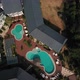 Spinning Aerial View Of Resort With Swimming Pool - VideoHive Item for Sale