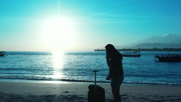 One woman sunbathing on perfect sea view beach time by clear sea and bright sandy background of the 