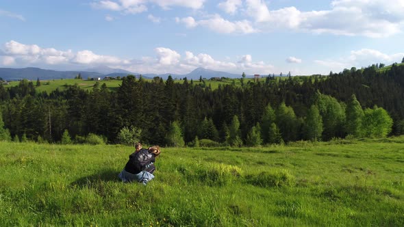 Photographer Woman Walking, Spring Day in Forest